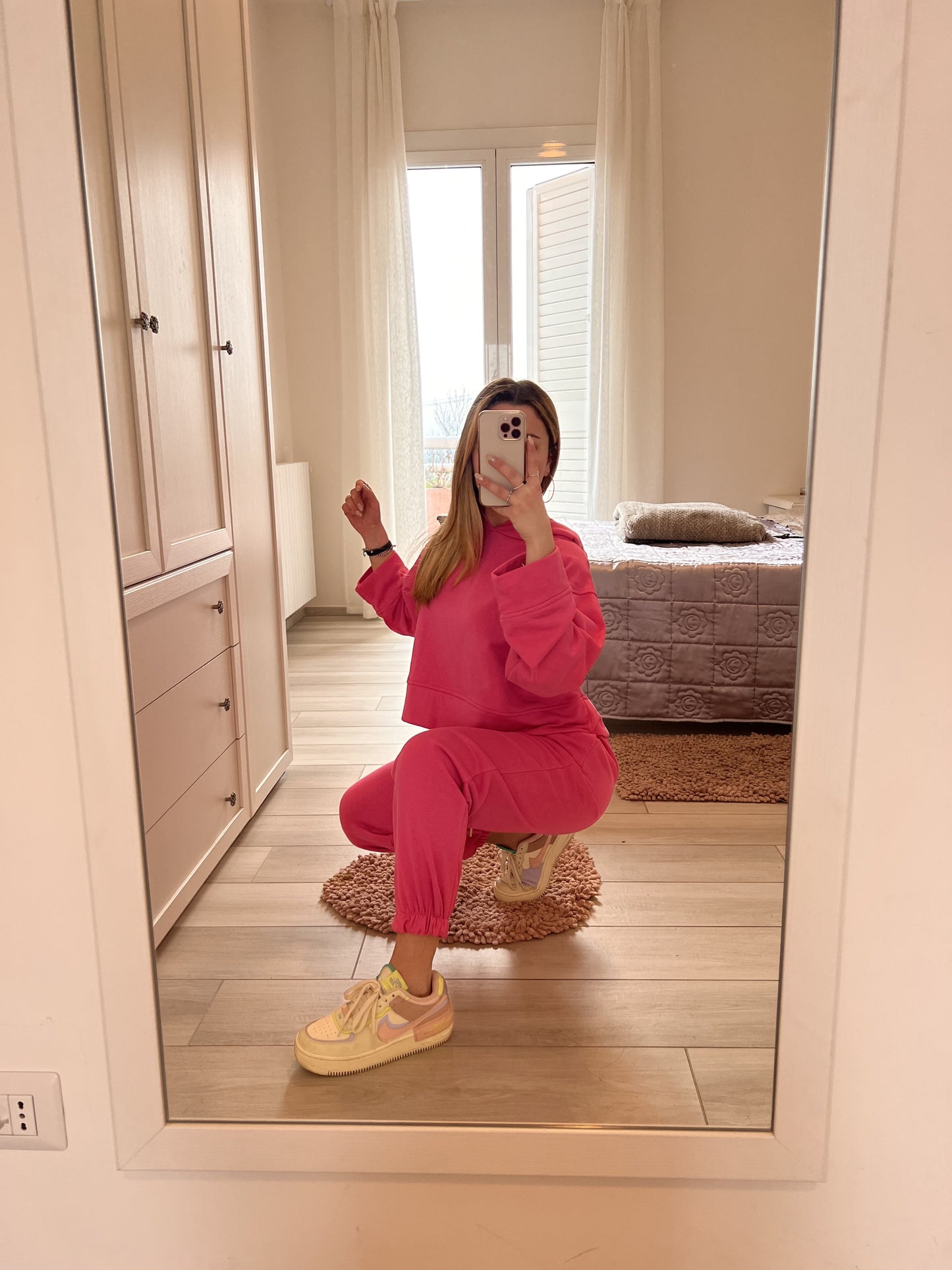 Tuta fucsia garzata