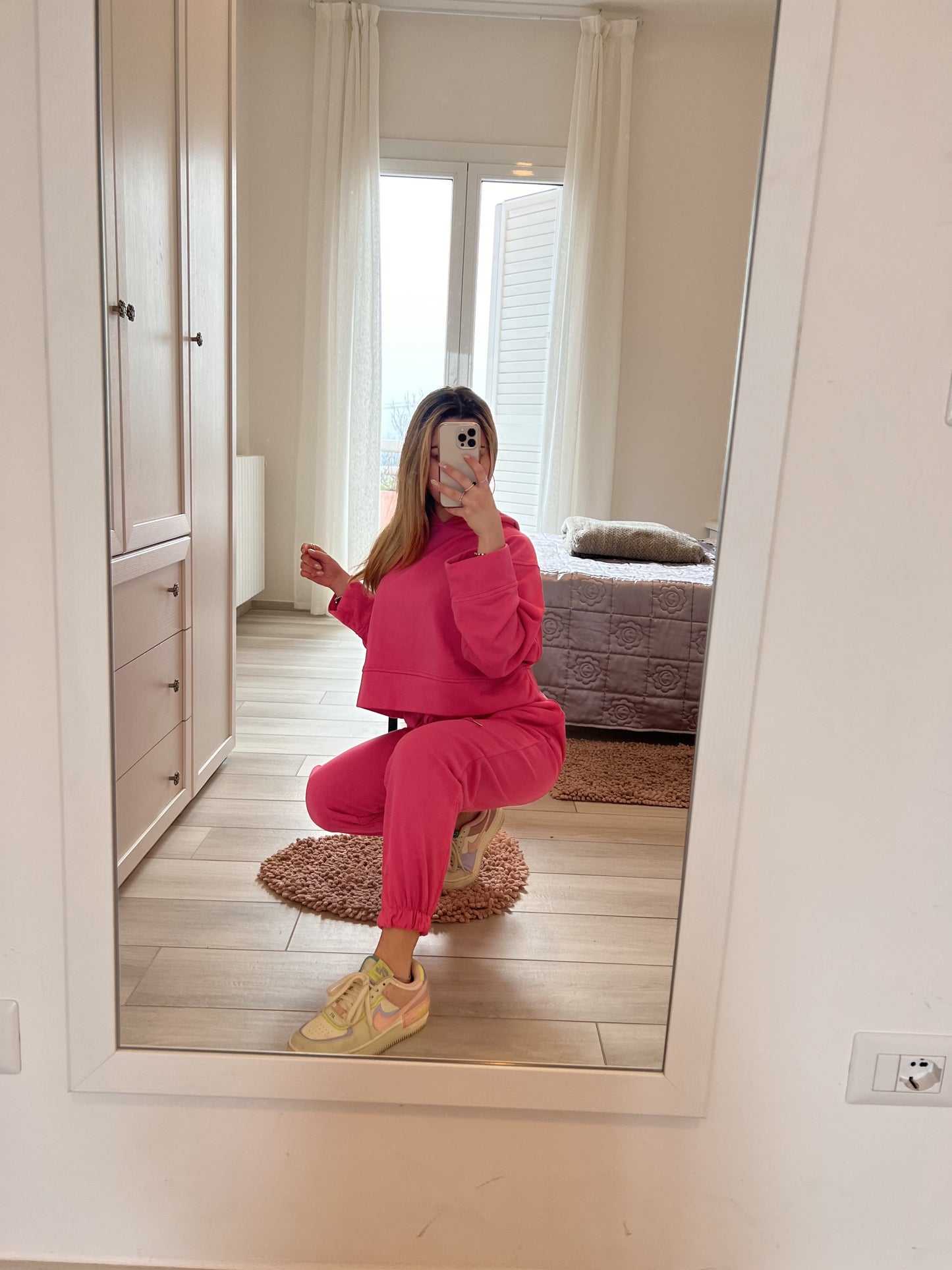 Tuta fucsia garzata