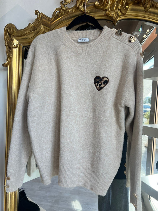 Maglione cuore con borchia