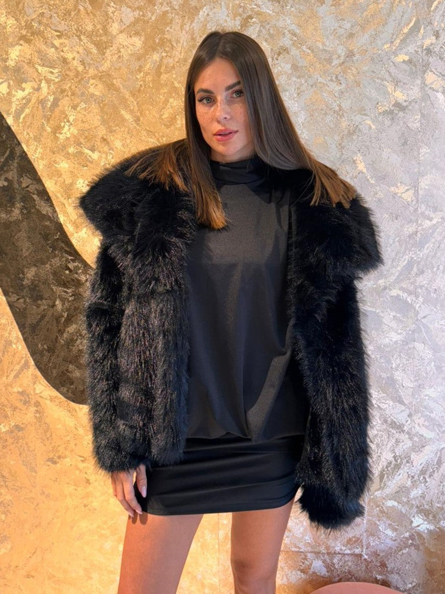 Abito con scollo schiena