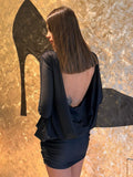 Abito con scollo schiena