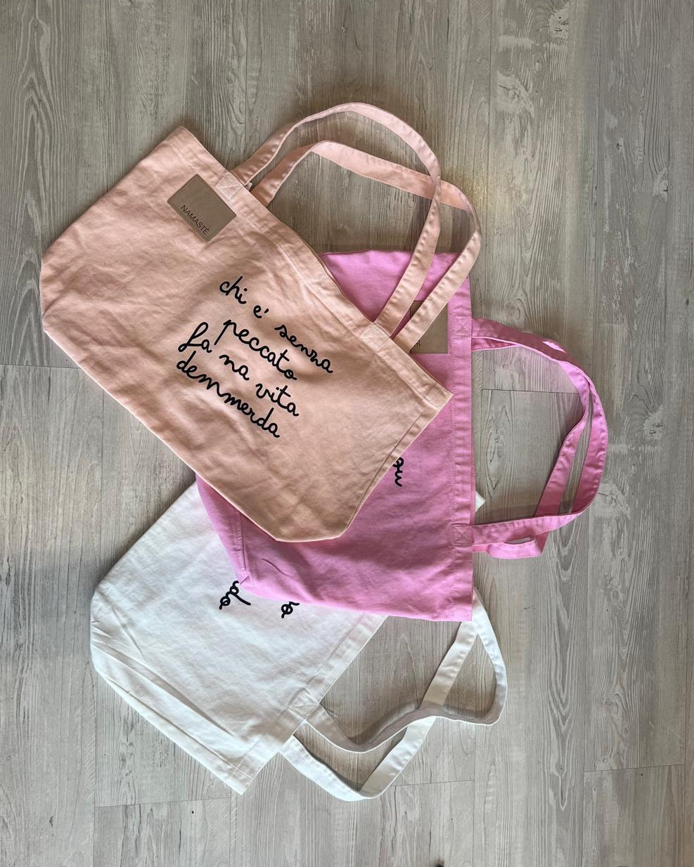 Borsa in tessuto con frasi V_BOR0TES