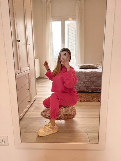 Tuta fucsia garzata