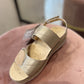 Sandalo foglia laminato oro
