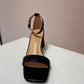 Sandalo con tacco geometrico in pelle nero - C2103AN